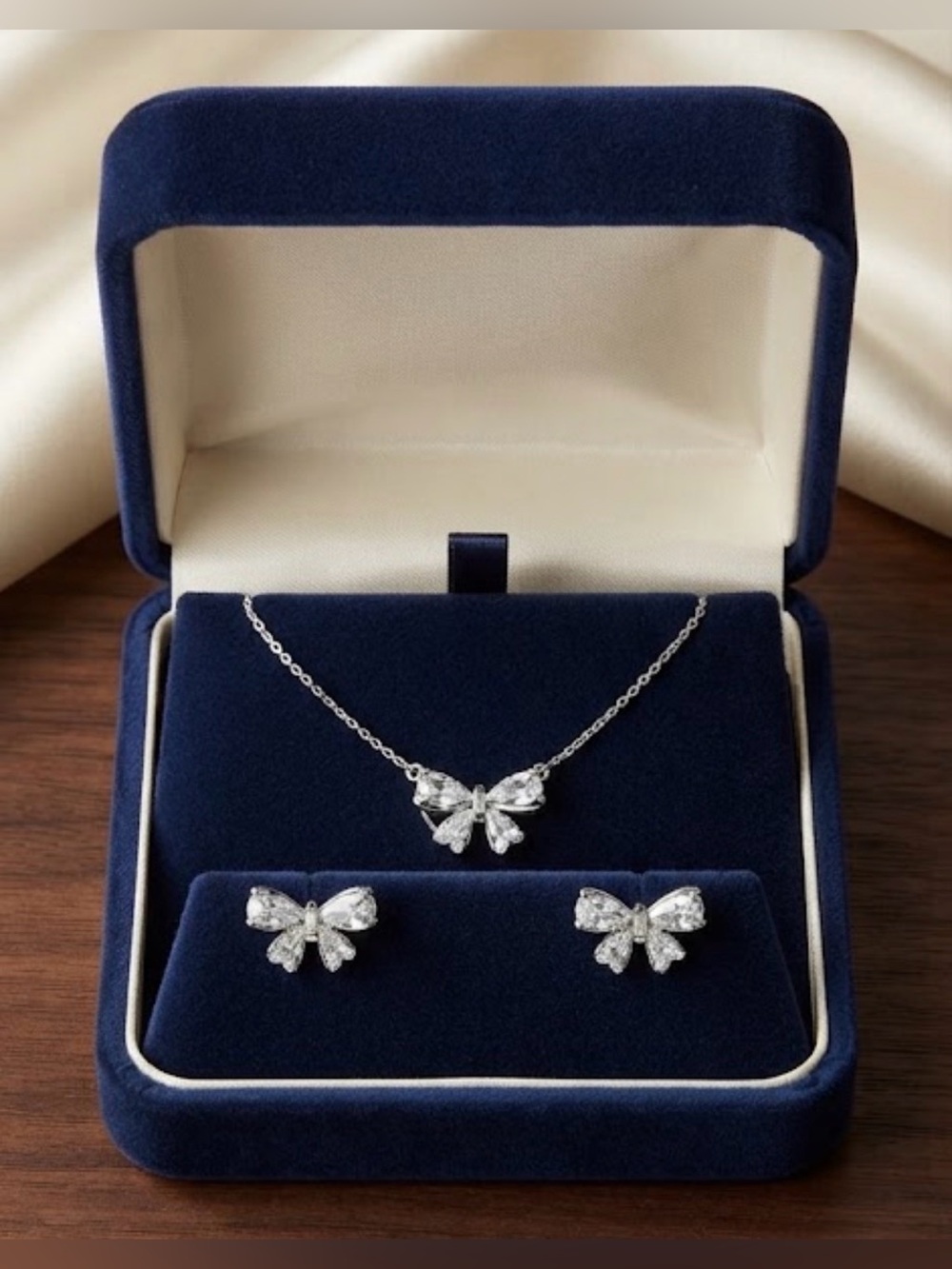 Set of Silver tone Bow Crystal Necklace and Stud Earrings